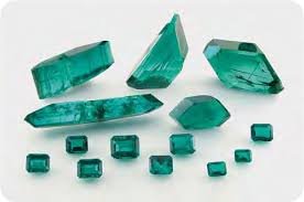 Hydrothermal Emerald rough and cut gems