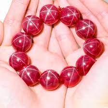 Synthetic red star Gems