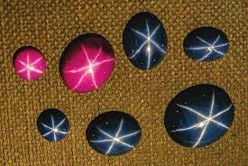 Synthetic blue and ruby color star Gems